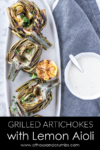 Delicious grilled artichokes with a zesty lemon garlic dipping sauce. A beautiful artichoke appetizer or side dish. #athousandcrumbs #grilled #artichokes #lemongarlic #dippingsauce