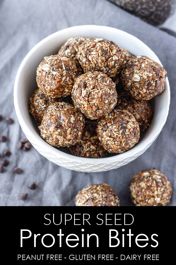 Freezer-friendly and peanut-free protein bites are a delicious snack or dessert. They are full of healthy fats, heart healthy seeds, and sweetened with just a touch of honey. #athousandcrumbs #proteinbites #freezerfriendly #glutenfree #dairyfree #norefinedsugar #peanutfree