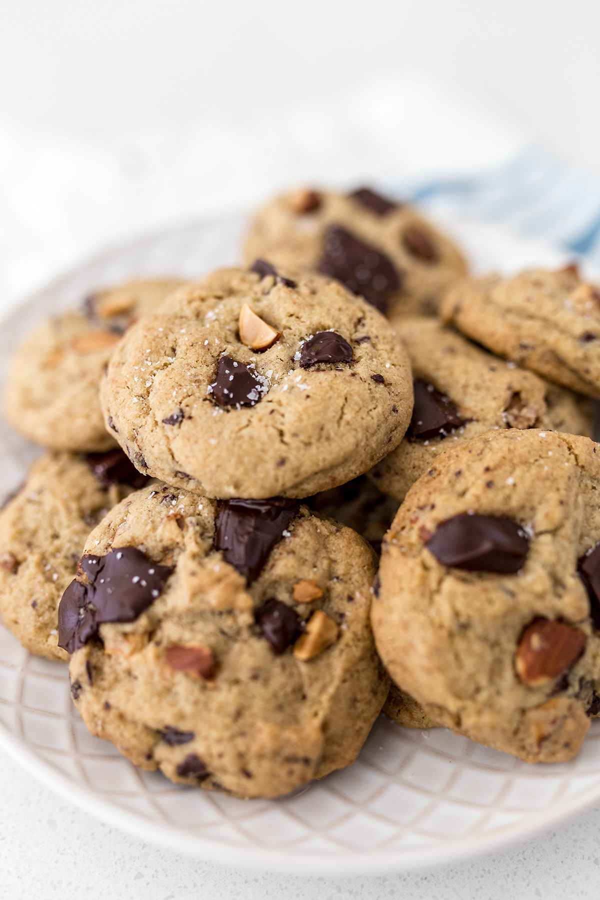 A plate of chocolate chip almond cookies.